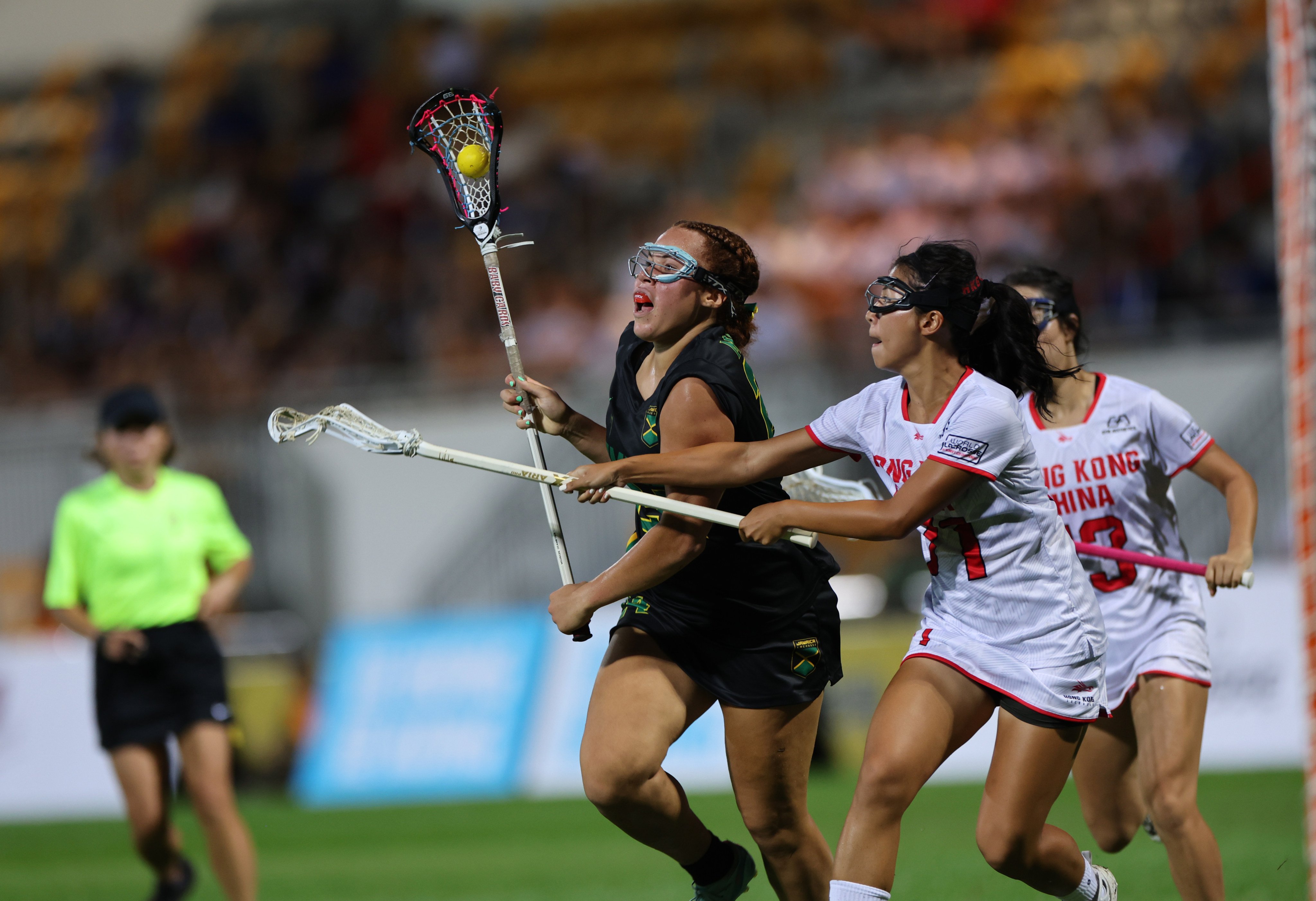 Jamaica’s Makayla Mitchell vies with Alexias Yip of Hong Kong at Mong Kok Stadium. Photo: Dickson Lee