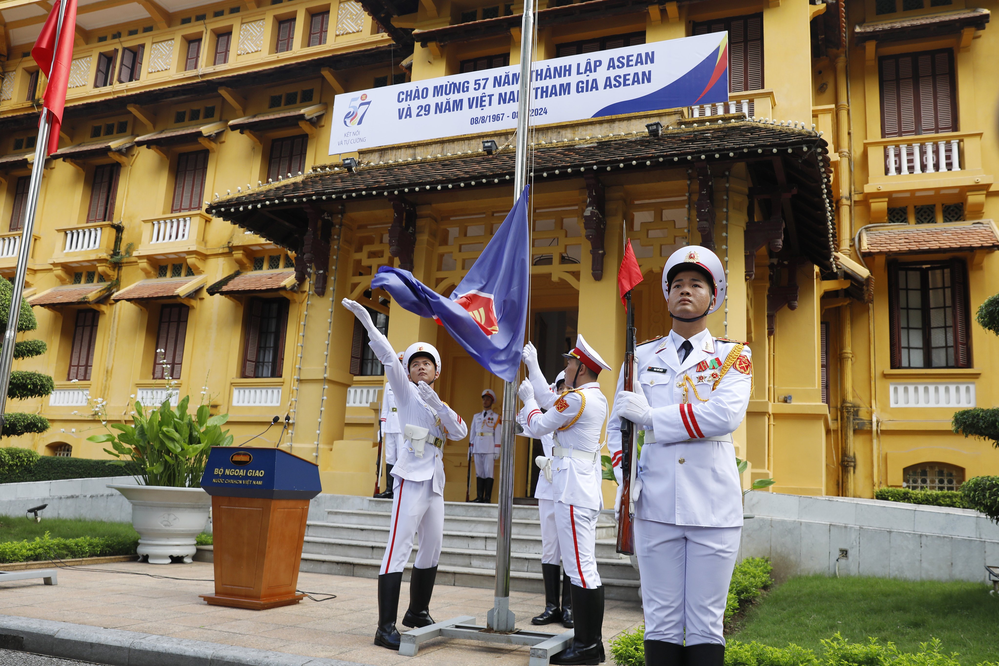 An honour guard raises an Asean flag outside the foreign ministry in Hanoi on August 8 to mark the 29th anniversary of Vietnam’s accession to the bloc. Photo: EPA-EFE