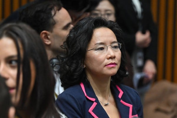 Australian journalist Cheng Lei observes a signing ceremony by China’s Premier Li Qiang and Australia’s Prime Minister Anthony Albanese on Monday. Photo: AFP